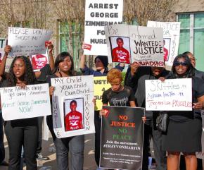 Students gather at a protest for Trayvon Martin outside the criminal justice building in Sanford, Fla.